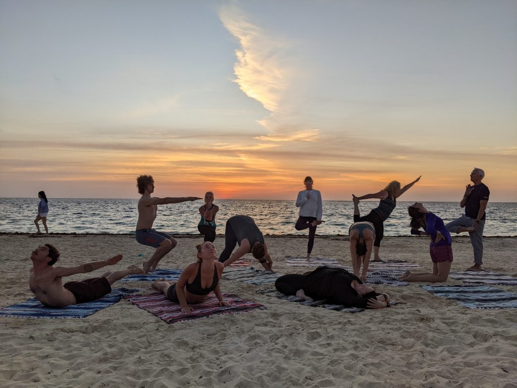 2024 casa om whole group on beach posture variety